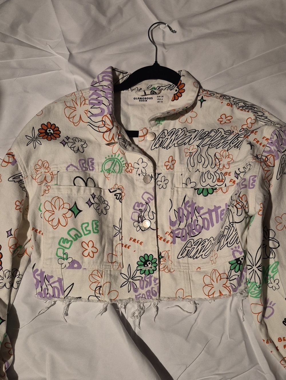 Glamorous White Cropped Denim Jacket with Multicolor Floral Graffiti